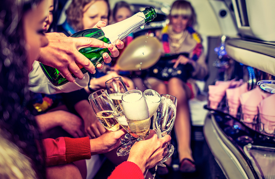 luxury hens party - women in a limo with champagne